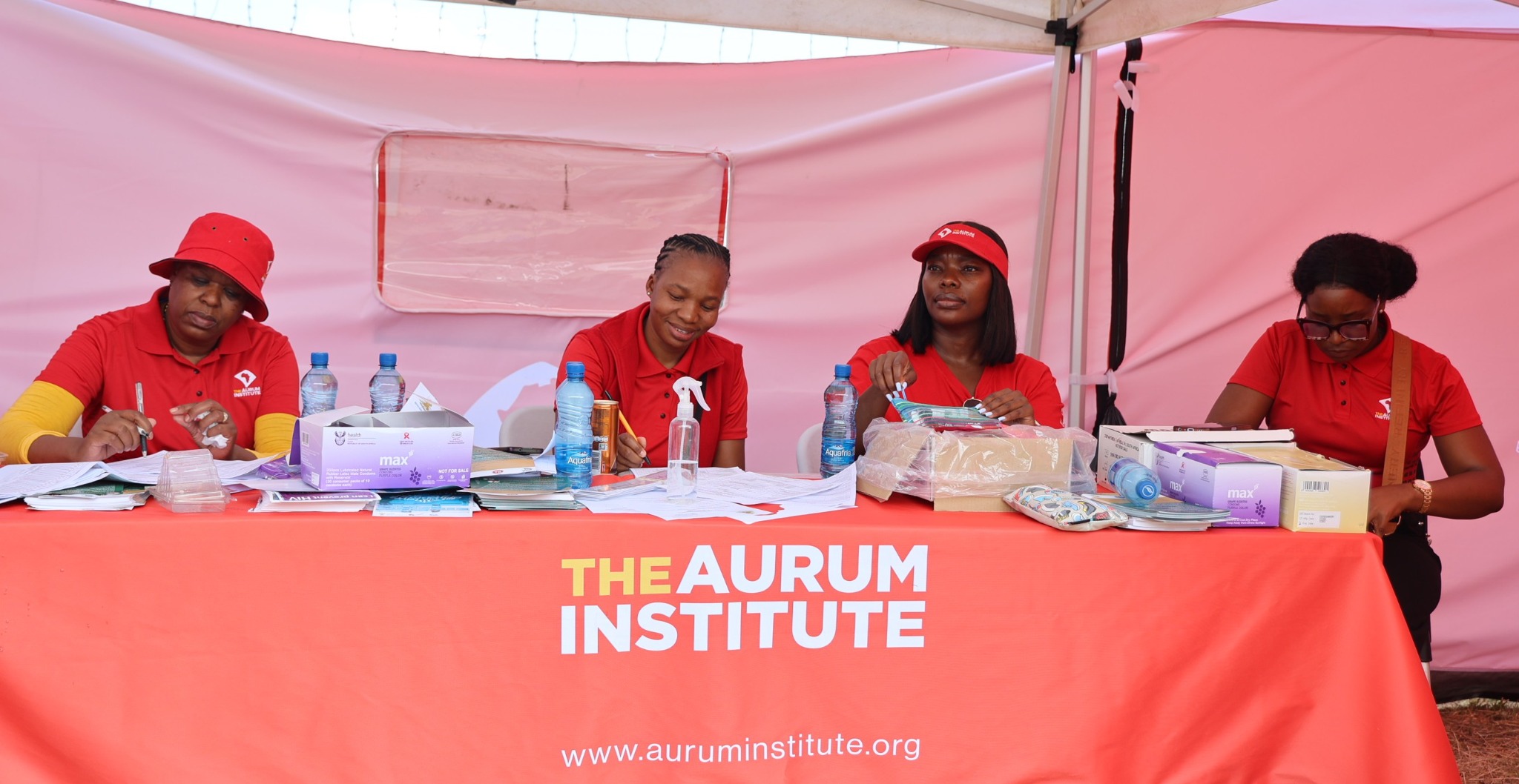 Aurum Institute team members delivering community health services