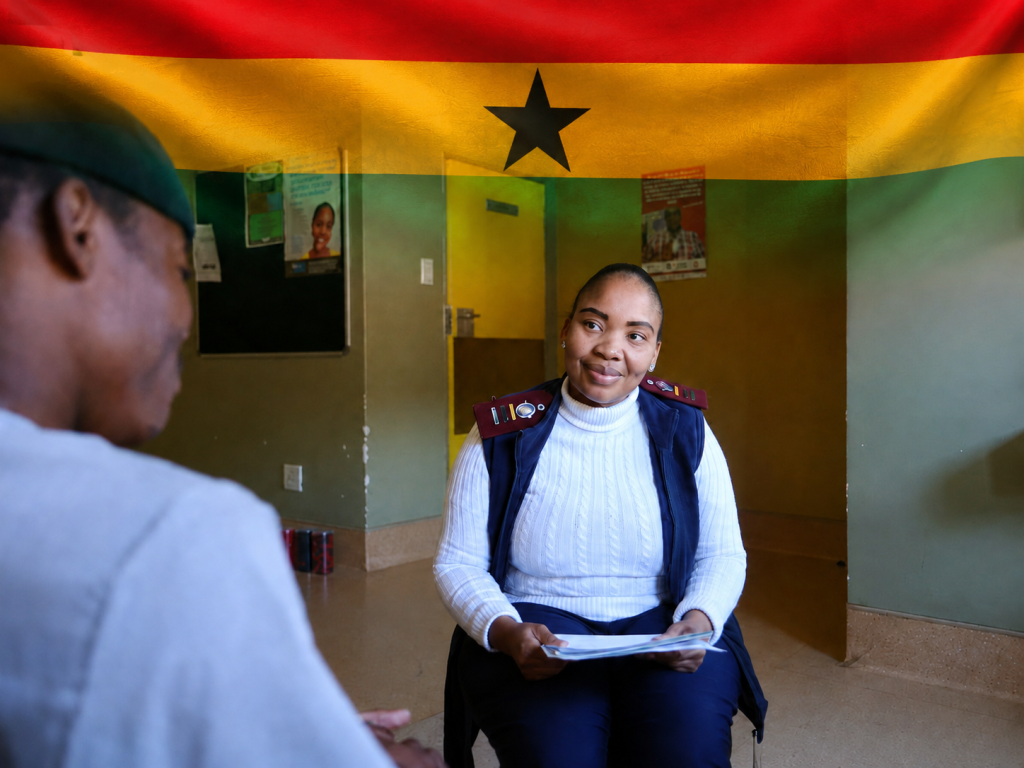 Aurum Ghana clinic visit, with the Ghanaian flag
